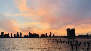 a city skyline at sunset