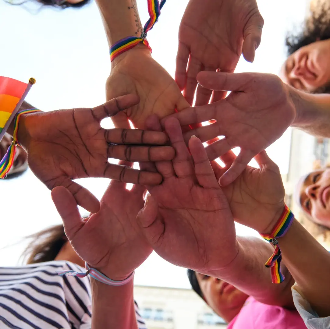 hands in circle LGBT